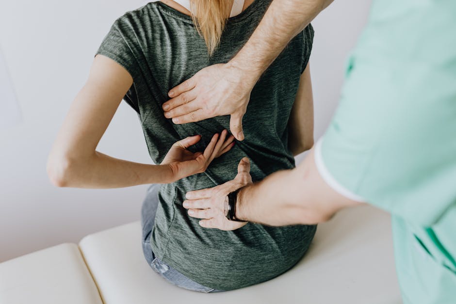Structural integration for back pain - Guild Certified Rolf Practitioner Joel Gheiler performing Structural Integration session in Boston
